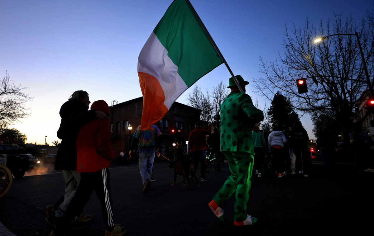 Kieran Hardy, visiting from New Jersey for his sister's 50th birthday, participates in Healdsburg's St. Patrick's Day Parade, Friday, March 17, 2023. Hardy is originally from Dublin, Ireland. (Kent Porter / The Press Democrat)