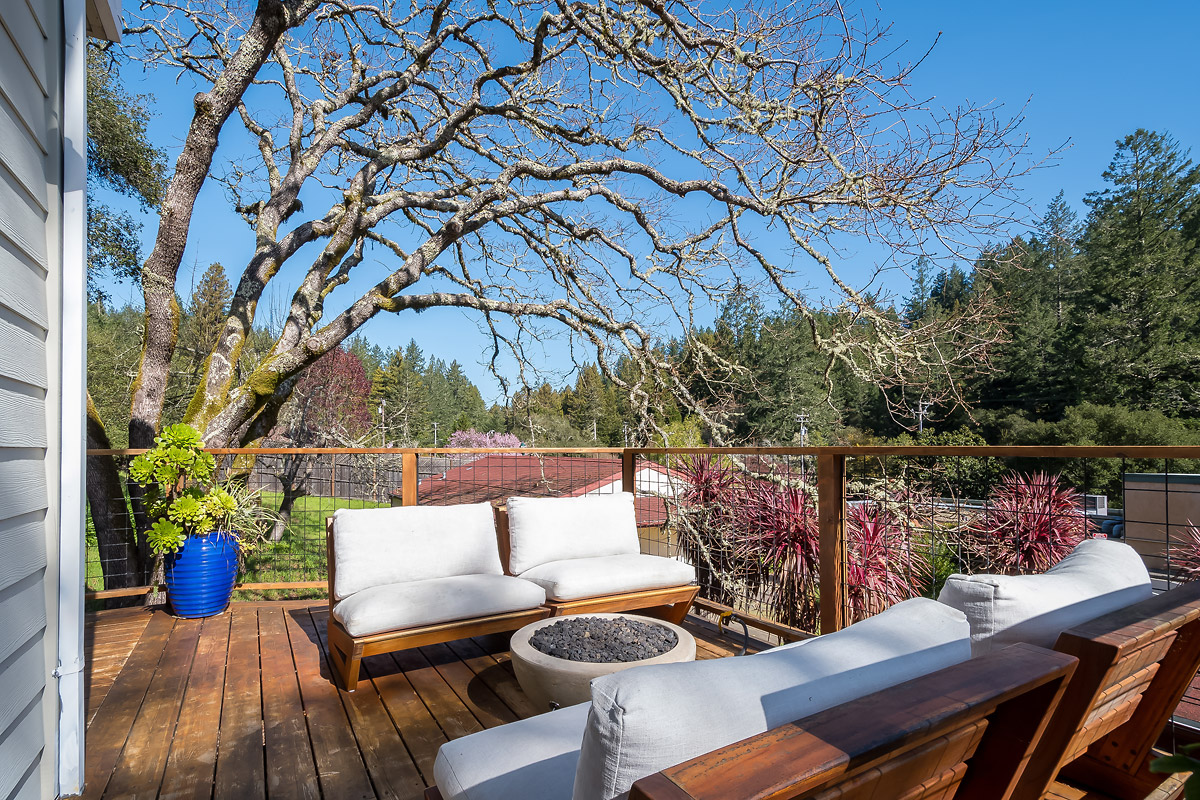 The wraparound porch offers tree views. (Kurt Lai)