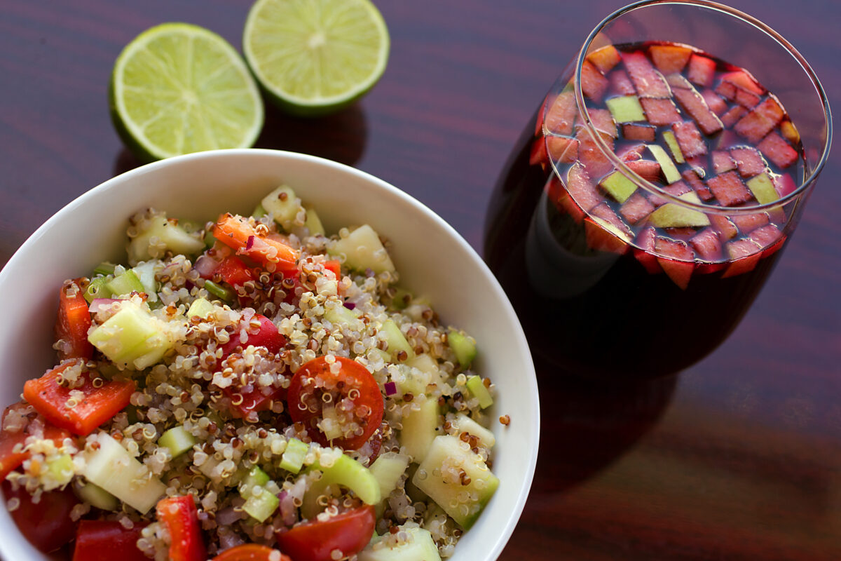 Ensalada Jardinera, with quinoa, bell pepper, celery, lime and cherry tomatoes and a purple corn based Chicha Morada drink from Quinua Cocina Peruana in Petaluma. (John Burgess/The Press Democrat)