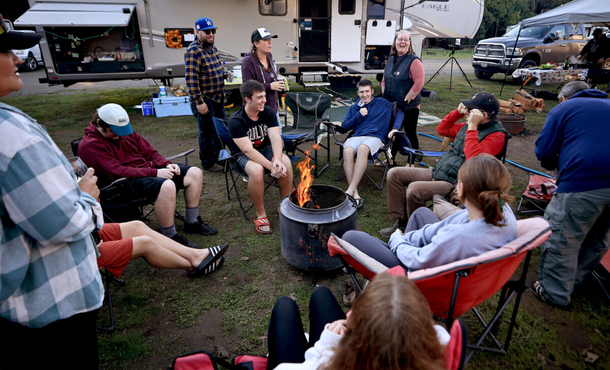 A campground full of friends of the Boland, Evans, Leone and Zapp families gather at Casini Ranch Family Campground in Duncans Mills, Saturday, Nov. 20, 2021 for Friendsgiving. (Kent Porter / The Press Democrat) 