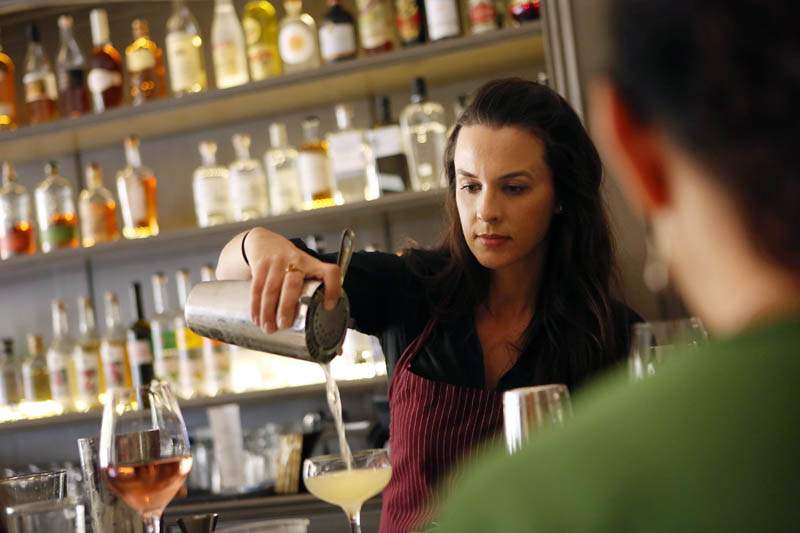Erica Van Emmerik pours drinks at the Chalkboard Restaurant's bar in Healdsburg on Tuesday, June 11, 2013. (Conner Jay/The Press Democrat)