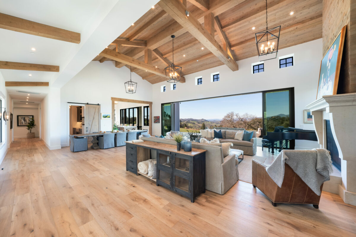 An open floor plan and walls of windows allow the outdoor setting to take focus. (Ned Bonzi / Sotheby’s International Realty)