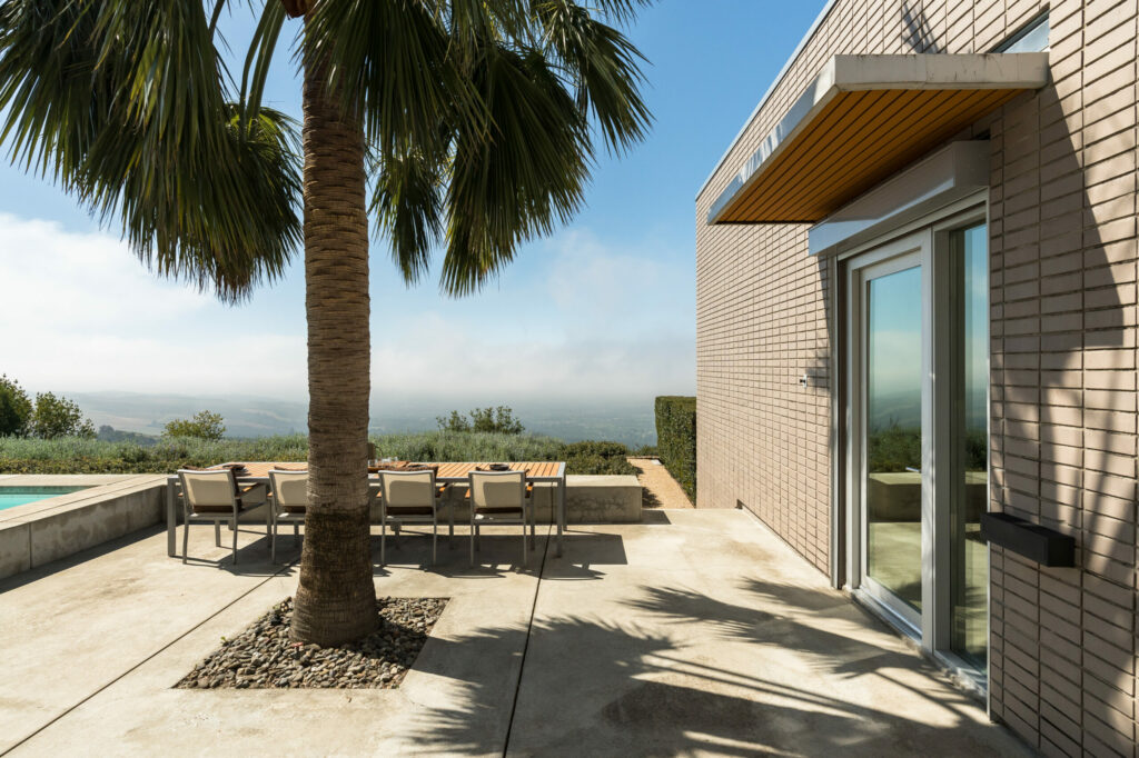 Pool, dining area and views. (Adam Potts)