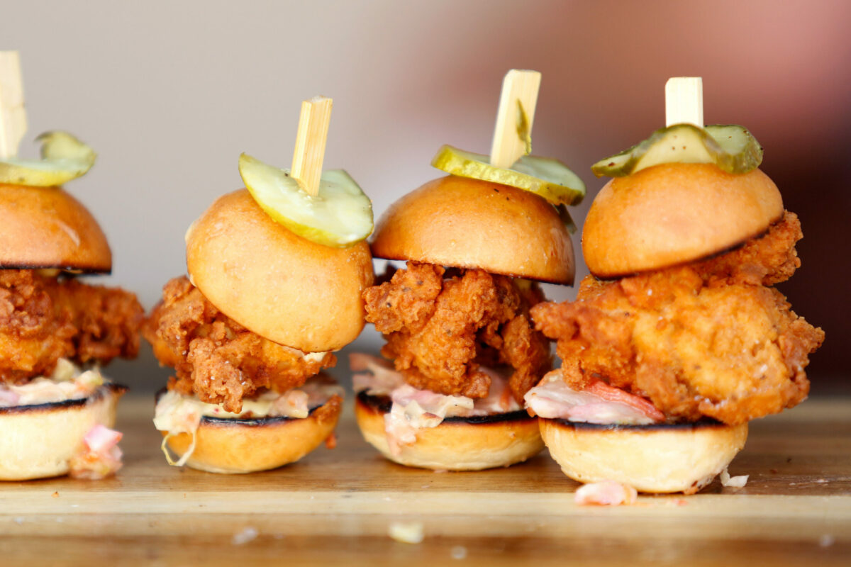 Buttermilk fried chicken sandwiches on a brioche roll with slaw and dijonnaise by chefs Marianna Gardenhire and Daniel Kedan of Backyard restaurant during the North Coast Food and Wine Festival at Sonoma Mountain Village in Rohnert Park, on Saturday, June 10, 2017. (Alvin Jornada / The Press Democrat)