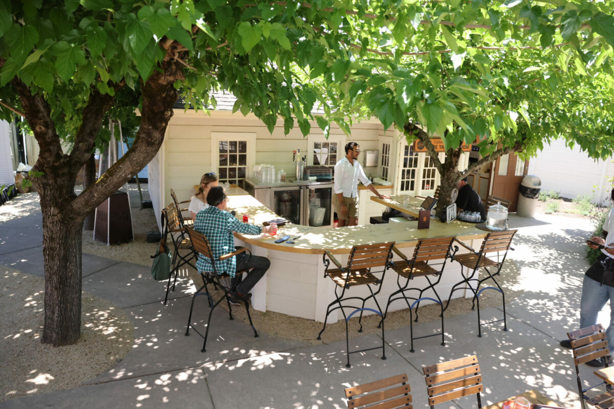 An outside bar and seating area at the Calistoga Depot in Calistoga, Monday, May 13, 2024. (Beth Schlanker / The Press Democrat)