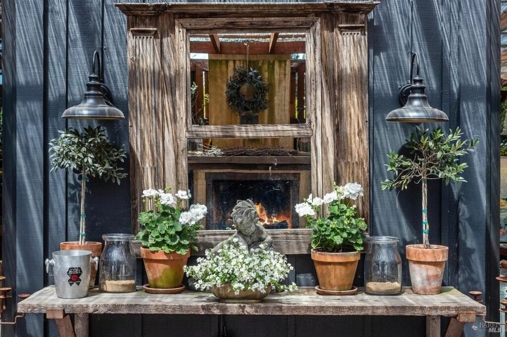 Sideboard and mirror on the patio. (Open Homes Photography)