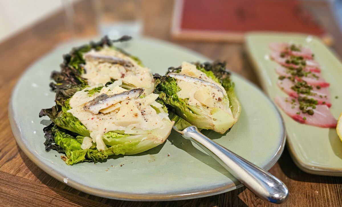 Grilled Caesar salad and yellowtail crudo at Farmstand restaurant at the Farmhouse Inn in Forestville. (Heather Irwin/The Press Democrat)