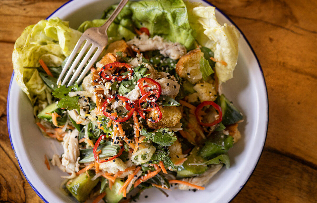Banh Mi Panzanella with lemongrass chicken, pickled carrot + daikon, bib lettuce, cilantro, Thai basil, cucumber and crunchy bread from Road Trip Monday, May 20, 2024 in Guerneville. (Photo by John Burgess/The Press Democrat)