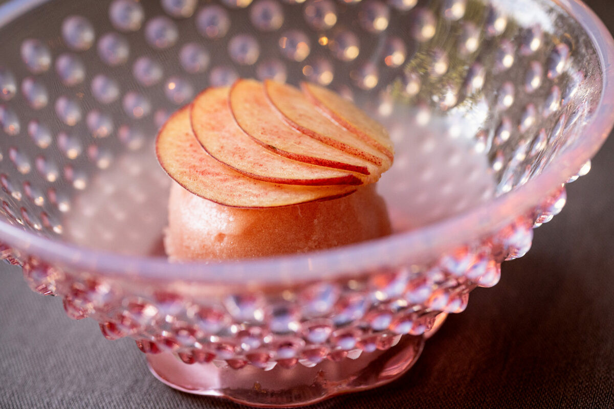 Dry Creek Farm White Peach Sorbet with Prosecco Jelly produced from the poached peaches used for the sorbet from chef Craig Wilmer at the Farmhouse restaurant on River Road in Forestville, Friday, Aug. 18, 2023. (John Burgess / The Press Democrat)