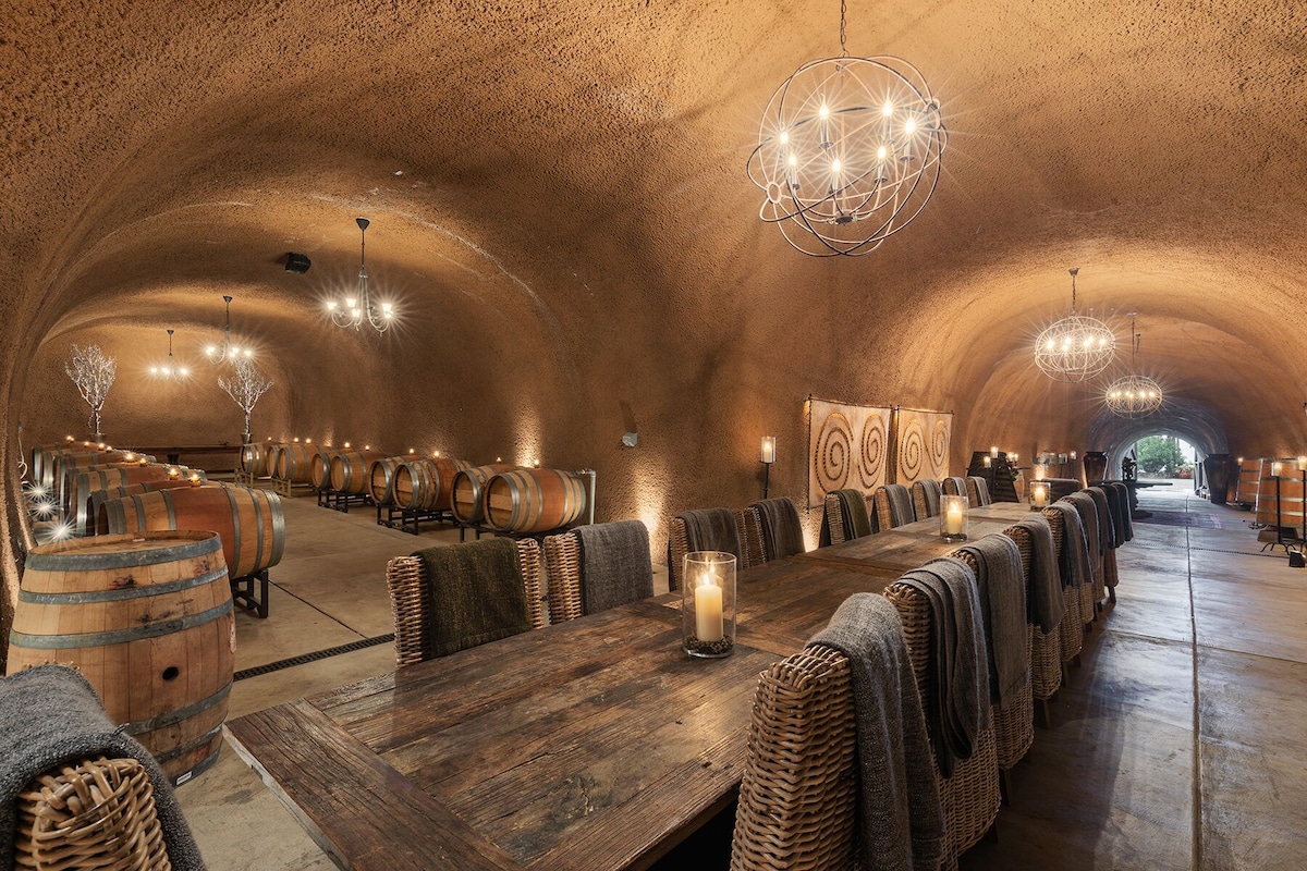 The wine cave includes a tasting table and games like football. (Vrbo)