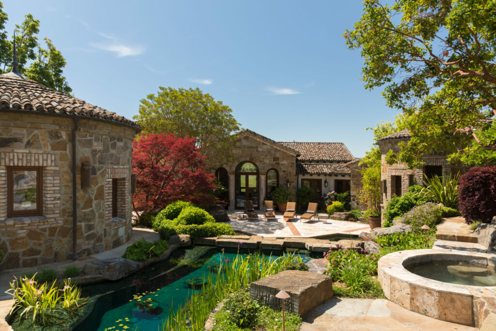 The grounds include bridges, water features, and an olive grove. (Peter Lyons)