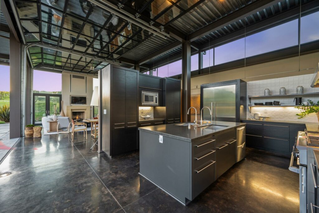 Kitchen and living room area. (Open Homes Photography / Sotheby’s International Realty)