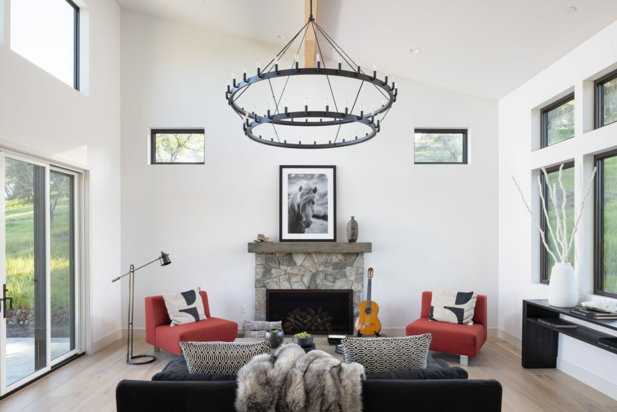 The open floor plan connects the living room, dining area and kitchen. (Steven Magner)