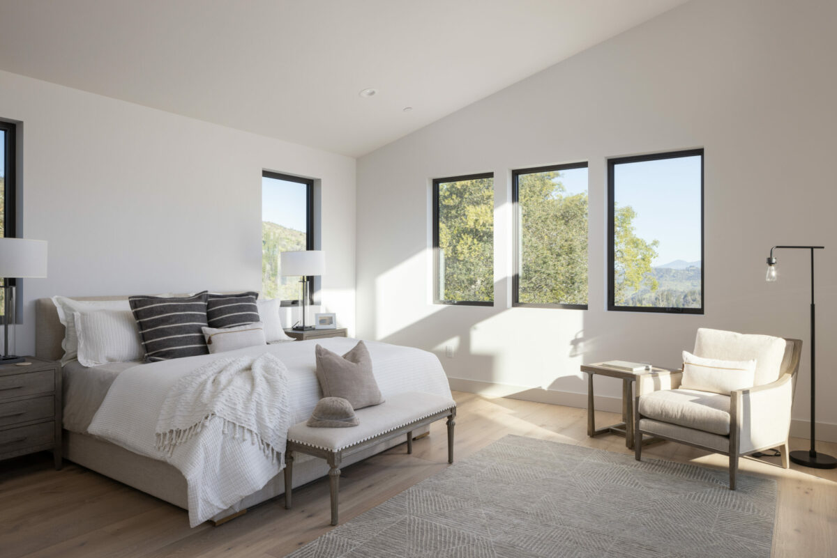 The interior is airy thanks to vaulted ceilings and plenty of windows overlooking the natural setting. (Ned Bonzi)