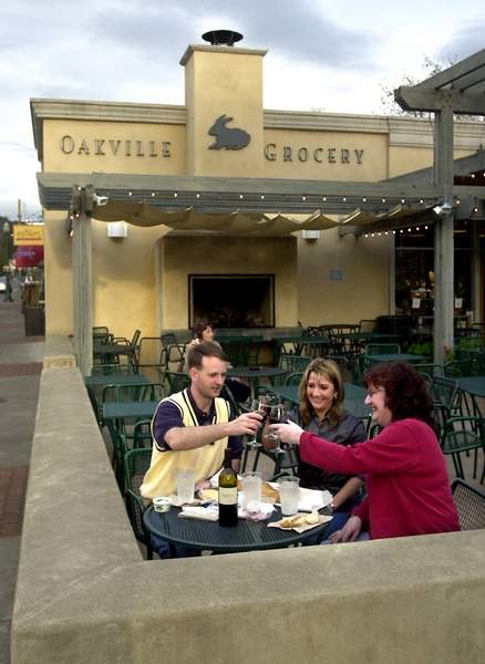 PC: Enjoying an early evening picnic on the patio at the Oakville Grocery in Healdsburg are Left to right, Sam Snow, Manassas, Virginia, Samantha McBride, Dallas, Texas, Deirdre Gordon, Chester, New Hampshire.3/26/2003: E1: Enjoying an early evening picnic on the patio at the Oakville Grocery in Healdsburg are, from left, Sam Snow of Manassas, Va.; Samantha McBride of Dallas, and Deirdre Gordon of Chester, N.H. 3/14/2007: D1: