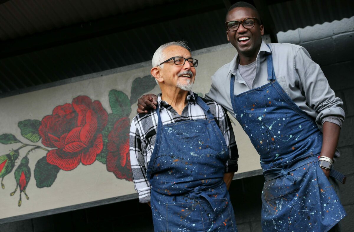 Artist Mario Uribe, left, and Mamadou Diouf have opened the Cafe Frida Gallery in the South of A Street arts district, in Santa Rosa.(Christopher Chung/ The Press Democrat)