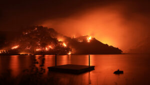The Point Fire burns actively on the west side, or the right flank of the fire, above Lake Merlo, Sunday, June 16, 2024. The area is just south of Lake Sonoma. (Kent Porter / Press Democrat)