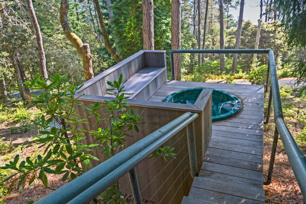 A wood-plank walkway leading to the hot tub. (Jim Nevill Productions)