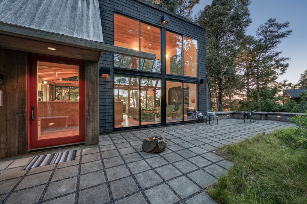 The paver patio has built-in seating for taking in views. (Jim Nevill Productions)