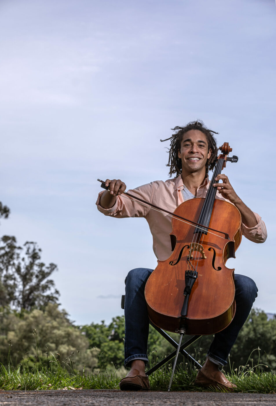 Cellist and music teacher Michael Fecskes, who is the artistic director of ViVO Youth Orchestras, a program that does music in schools for underserved youth in Sonoma Valley, photographed at Sonoma’s Bartholomew Park June 3, 2024. (Chad Surmick / The Press Democrat)