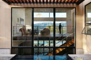 The newly built home of Steve Lacy and Debbie Thomas in Alexander Valley. A two-story window connects to a stairway down to the guest room. (Eileen Roche/Sonoma Magazine)