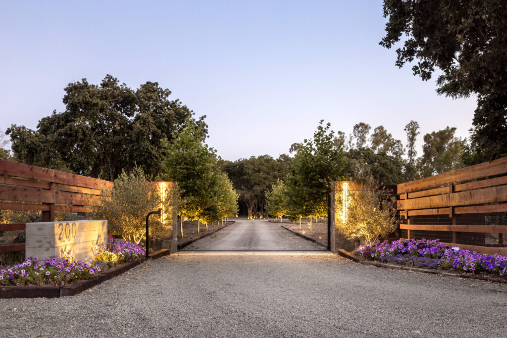 Driveway and gate opening up to the three-acre property. (Jacob Elliot)