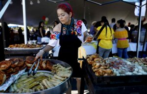 Olivia Estrada fries flautas during the Fiesta de Independencia at the Luther Burbank Center for the Arts in Santa Rosa on Sunday, Sept. 16, 2018. (Beth Schlanker / The Press Democrat)