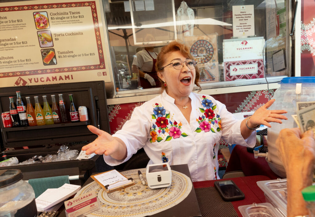 Rosalinda “Rosy” Sanchez serves up street food from the Yucatan with a smile at Yucamami in Mitote Park Wednesday, June 5, 2024 in Santa Rosa. (Photo by John Burgess/The Press Democrat)
