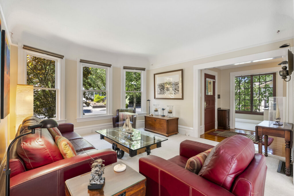 The home was renovated in 2008, but maintains vintage details like the coved ceiling in this living room. (Courtesy of Rob Sullivan)