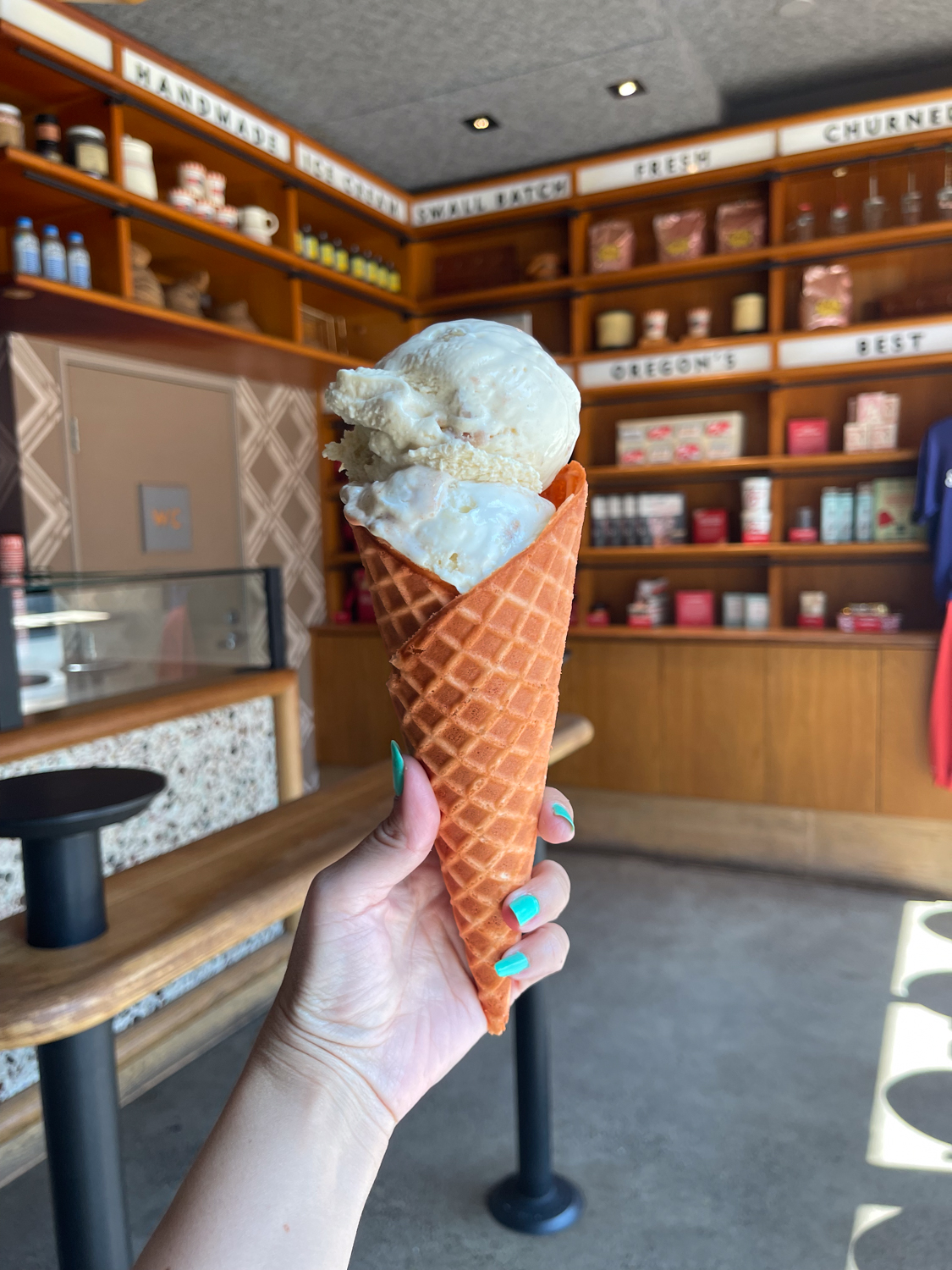 Ice cream in a pumpkin spiced waffle cone from Salt & Straw. The waffle cone, made in partnership with spice company Diaspora Co., is infused with a blend of warming spices like cinnamon and allspice. (Courtesy of Salt & Straw)