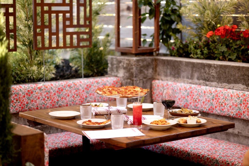 Pepperoni pizza in the corner table in the garden patio at Campanella Friday, Sept. 6, 2024, in Sebastopol. (John Burgess / The Press Democrat)