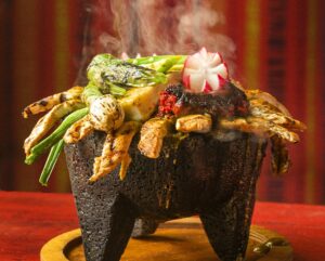 Molcajete Poblano of roasted poblano chile, chicken, chorizo, queso Panela, onions, radish and cactus from Los Molcajetes Bar & Grill in Rincon Valley on Wednesday, September 9, 2020. (Photo by John Burgess/The Press Democrat)