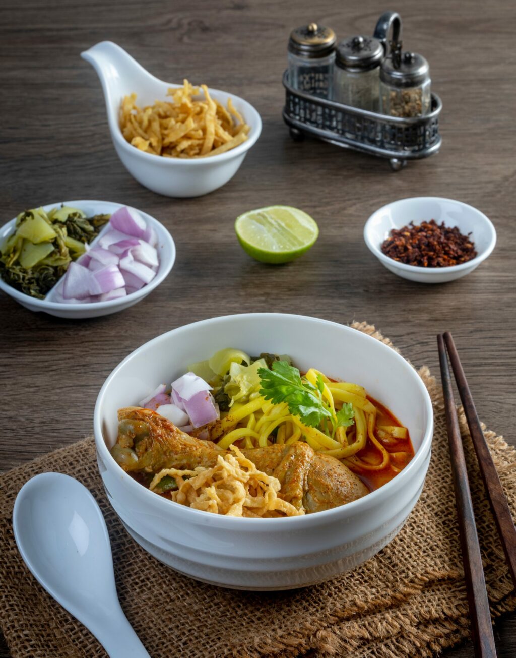 Khao Soi Thai Zen in Santa Rosa serves Khao Soi, a yellow curry with fried noodles, pickled mustard leaves and steamed egg noodles. Pictured here with chicken. (Jaded Art/Shutterstock)