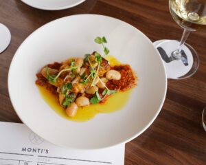 Fish and butter beans at Monti's in the renovated Montgomery Village space in Santa Rosa. (Courtesy of Monti's)