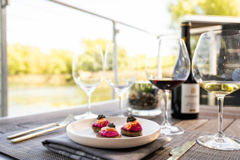 Sip wine by the water at the new, open-air boathouse pavilions at Cuvaison Winery in Napa. (Courtesy of Cuvaison Winery)