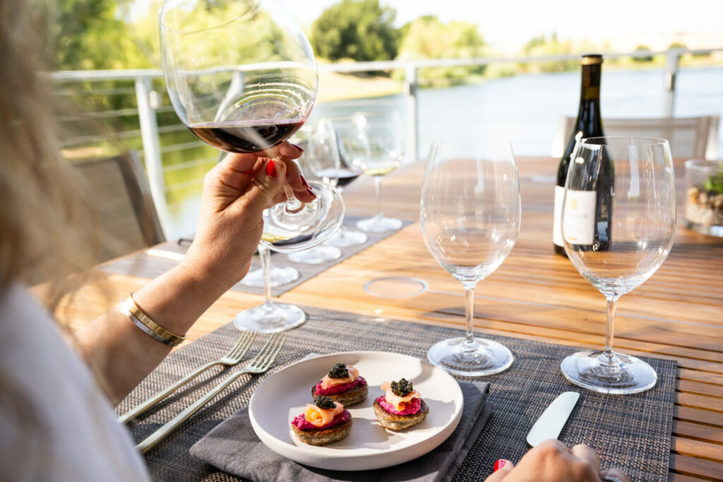 Sip wine by the water at the new, open-air boathouse pavilions at Cuvaison Winery in Napa. (Courtesy of Cuvaison Winery)
