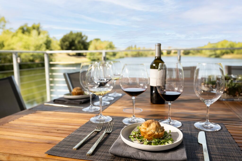 Sip wine overlooking the water at the new, open-air boathouse pavilions at Cuvaison Winery in Napa. (Courtesy of Cuvaison Winery)
