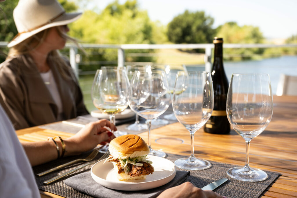Sip wine by the water at the new, open-air boathouse pavilions at Cuvaison Winery in Napa. (Courtesy of Cuvaison Winery)
