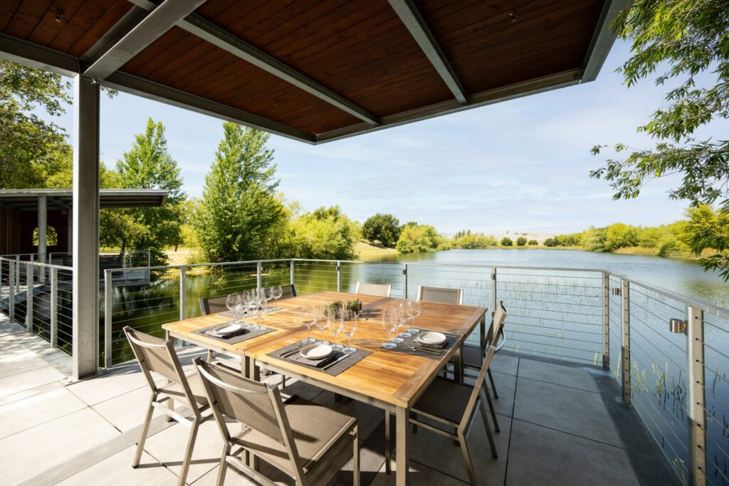Sip wine overlooking the water at the new, open-air boathouse pavilions at Cuvaison Winery in Napa. (Courtesy of Cuvaison Winery)