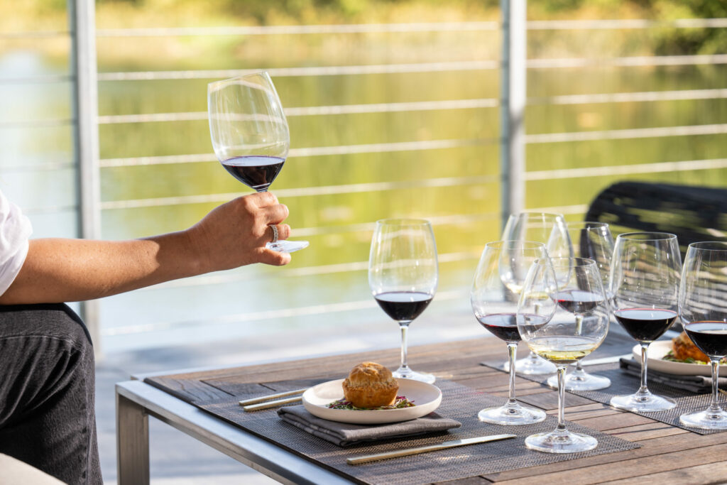 Sip wine by the water at the new, open-air boathouse pavilions at Cuvaison Winery in Napa. (Courtesy of Cuvaison Winery)