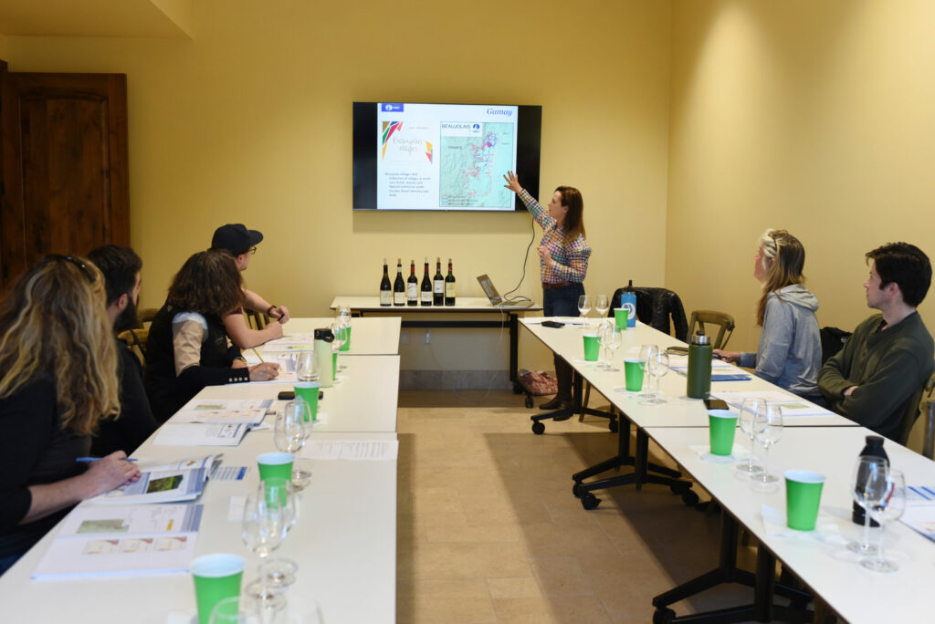Julie Rothberg, president of Medlock Ames winery, during a wine education class focusing on a few varietals from France and Spain at the Odyssey Wine Academy founded by Rothberg and held at Bacchus Landing in Healdsburg, Tuesday, March 15, 2022. (Erik Castro/for The Press Democrat)