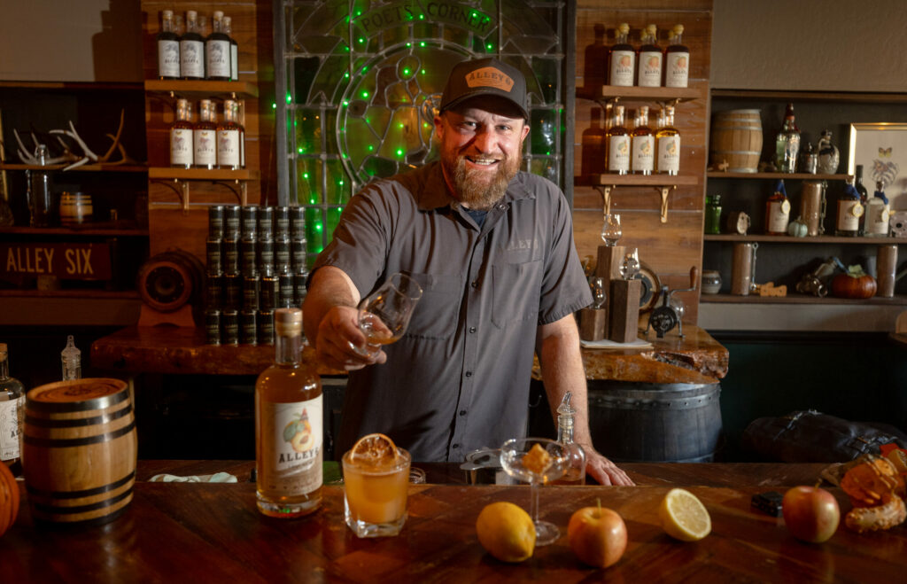 Jason Jorgensen travelled the world as a bartender before starting Alley 6 Craft Distillery in a Grove Street industrial park Tuesday, October 8, 2024 in Healdsburg. (John Burgess / The Press Democrat)