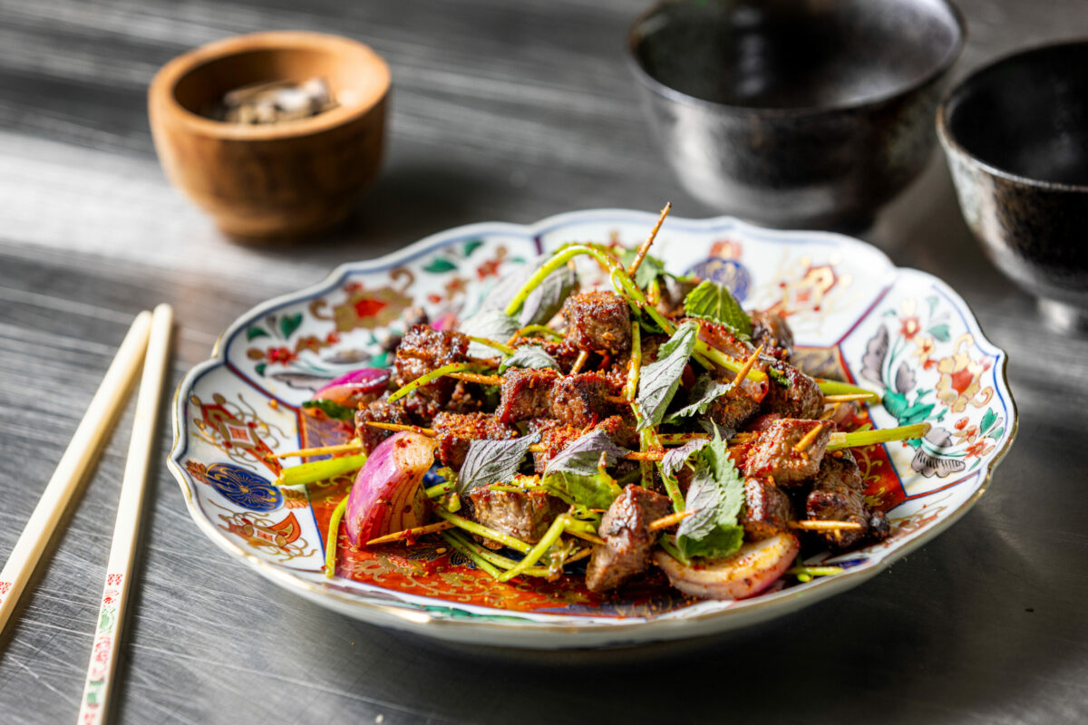 Toothpick Beef dusted with peanuts and intense aromatics served as a finger food or over rice from Bazaar Sonoma, BaSo | Restaurant & Konbini, Oct. 17, 2024, in Forestville. (John Burgess / The Press Democrat)
