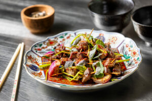 Toothpick Beef dusted with peanuts and intense aromatics served as a finger food or over rice from Bazaar Sonoma, BaSo | Restaurant & Konbini Oct. 17, 2024 in Forestville. (John Burgess / The Press Democrat)