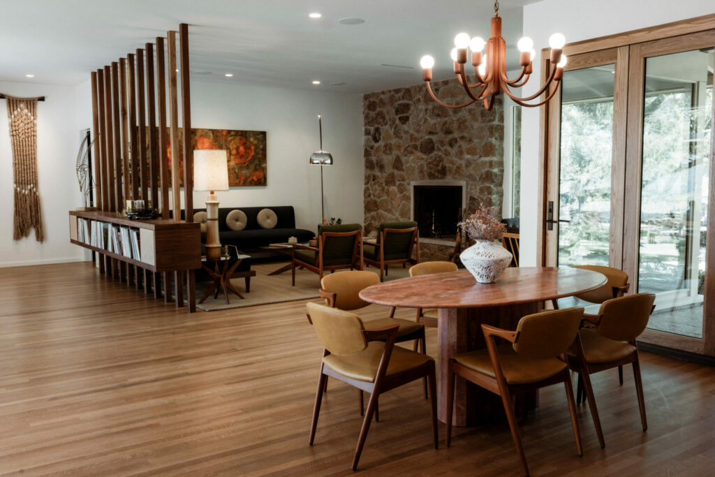The revamped Stony Hill in St. Helena includes a stylish living room lounge where vinyl records spin, plus a cozy library and a patio that showcases sweeping mountain views. (Courtesy of Stony Hill)