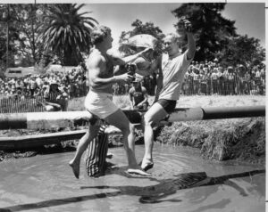 Kenwood Pillow Fights: Tom and Dick Smothers sock it out on the pillow fighting pipe. (Dawson, 7/4/1980)