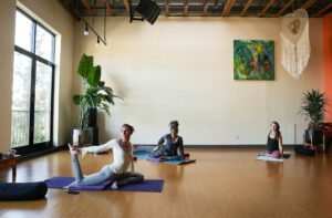 Tirza Dawn, left, leads her Lit Yoga class in the Loft at Soft Medicine Sanctuary in Sebastopol on Wednesday, October 11, 2023. (Christopher Chung/The Press Democrat)