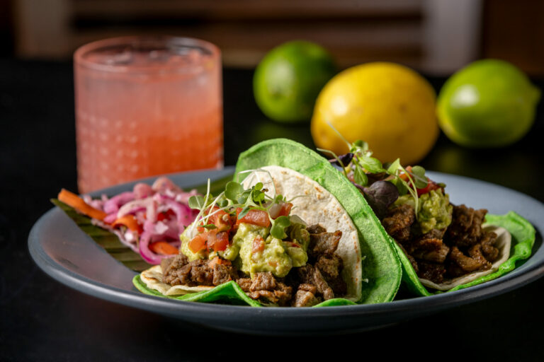 Tacos al Carbon with carne asada, a double tortilla with melted cheese in between, sour cream, guacamole & pico de gallo from El Milagro Healdsburg, a block west of the square Friday, Nov. 1, 2024, in downtown Healdsburg. (John Burgess / The Press Democrat)