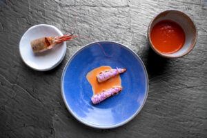 Sequence of Spot Prawn: Bisque made with the shells, grilled tail with rose geranium, prawn head XO at Enclos restaurant in Sonoma. (Bonjwing Lee)