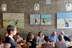 Guests enjoy food prepared from chef Joyce Goldstein's new cookbook, The New Mediterranean Jewish Table, during a Book Passage Cooks with Books event at Spinster Sisters in Santa Rosa, California on Wednesday, June 1, 2016. (Alvin Jornada / The Press Democrat)